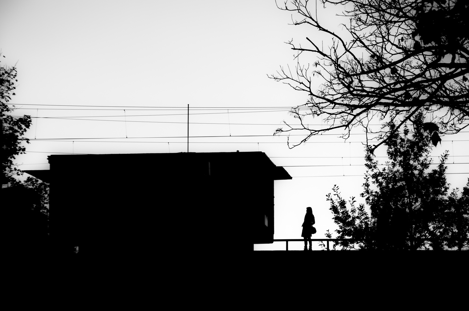 a woman waiting for the train