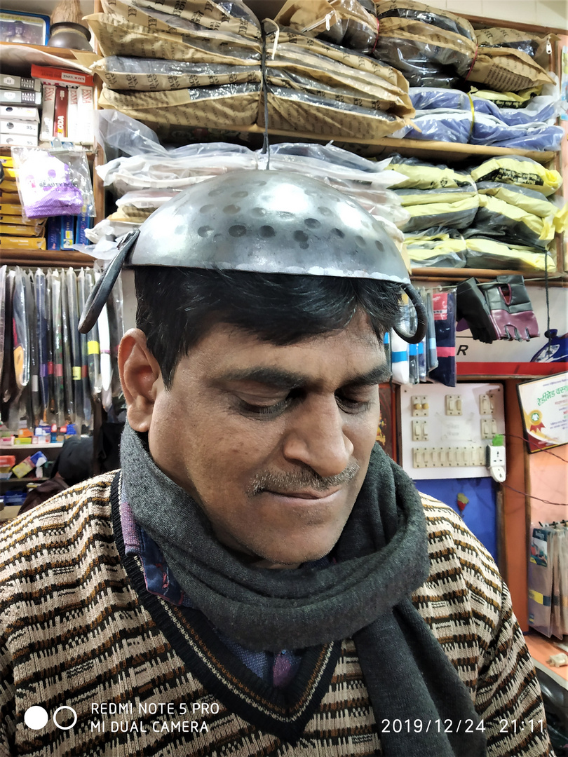 A Working Man With Iron Cap