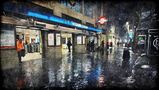 HolSta1 __ DOWNPOUR AT THE TUBE EXIT__ by ann mari cris aschieri