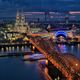 Klner Dom zur blauen Stunde mit Skyline