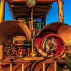 abandoned, rusting, cannibalized forklift