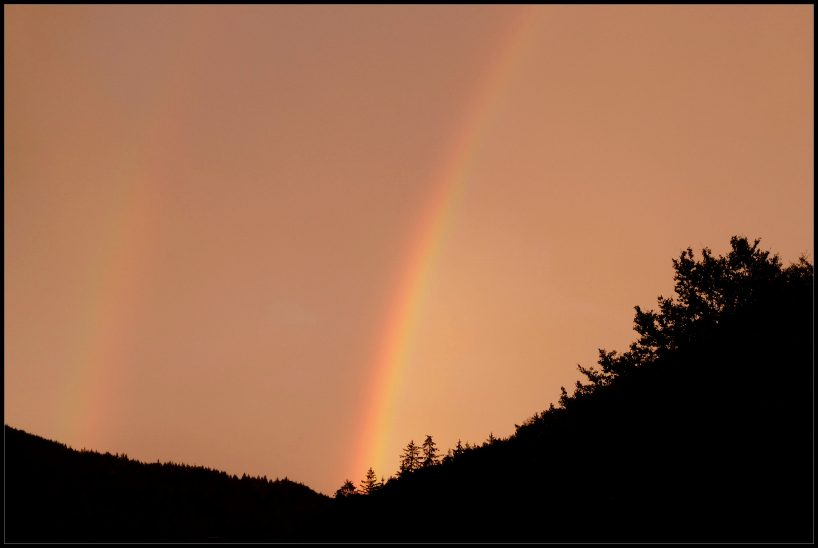 Abendhimmel mit Regenbogen