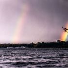 Abendliche Wetterstimmung mit Regenbögen