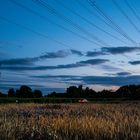 Abendrot mit romantischer Hochspannungsleitung