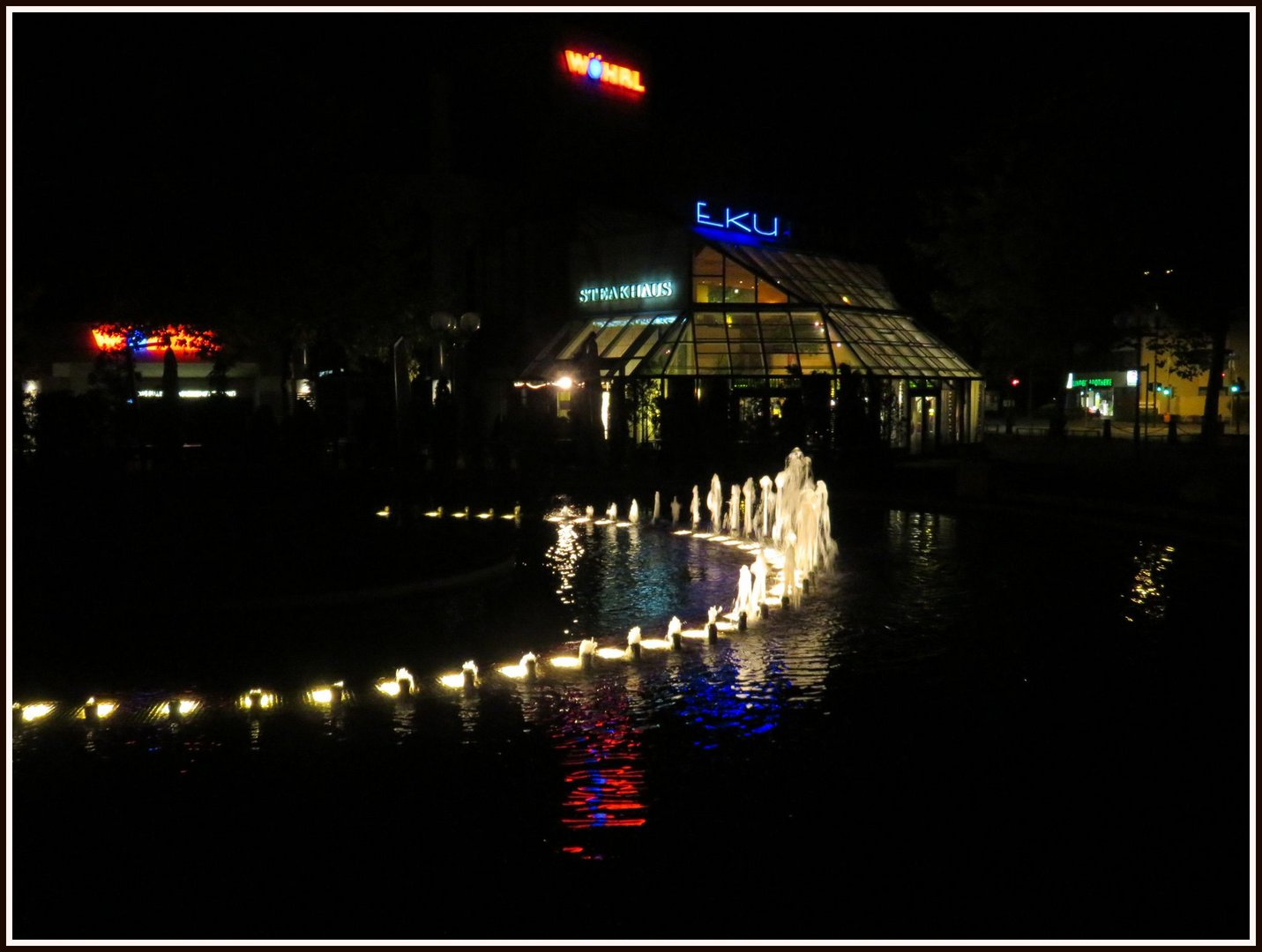 Abends am Brunnen