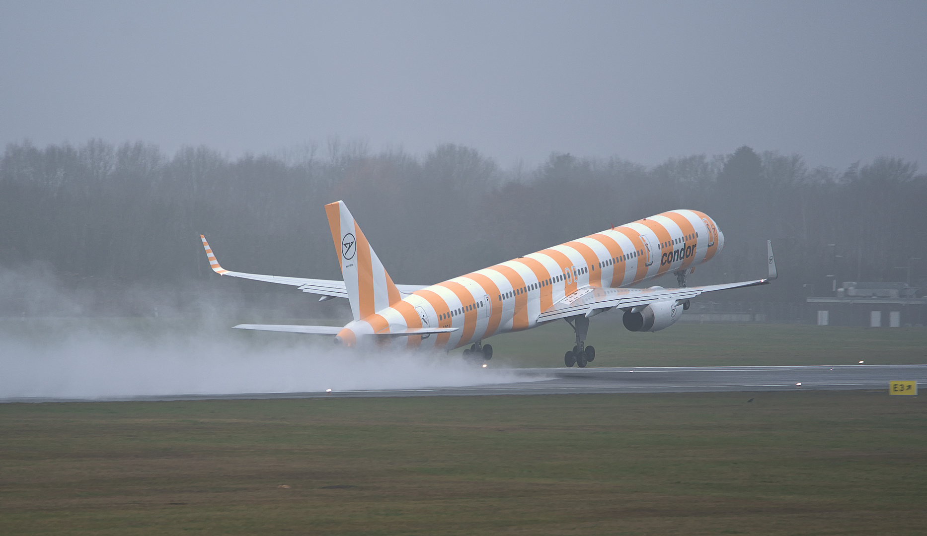 Abflug im Regen