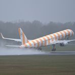 Abflug im Regen