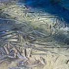 Abstract: Macro ice crystals reflecting the colors of their surroundings.