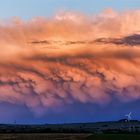 Abziehende Gewitterwolke bei Sonnenuntergang