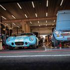 AC Cobra Daytona Coupé und MGB in the pits.