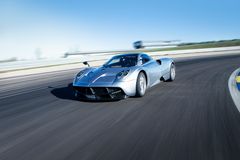 Adrian Sutil driving the Pagani Huayra at Autodromo die Modena