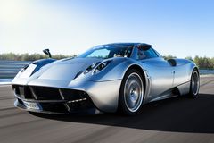 Adrian Sutil driving the Pagani Huayra