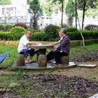 Ältere Herren beim Spielen im Yangshuo Park