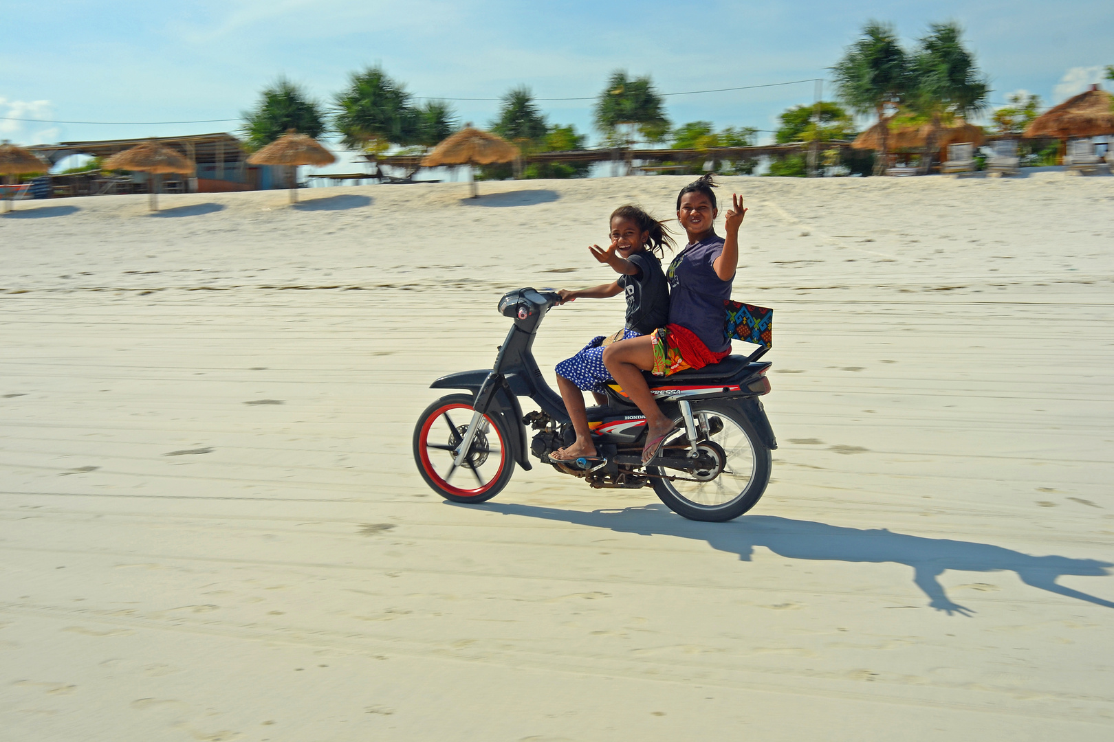 After school freedom...motorcycle on the beach.