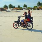 After school freedom...motorcycle on the beach.