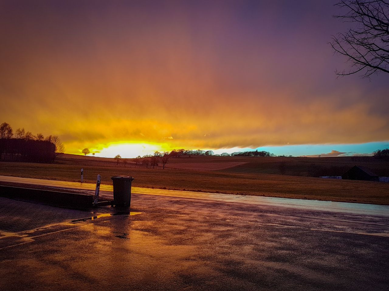 After the rain. Trashcan ist watching sunset.