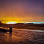 After the rain. Trashcan ist watching sunset.