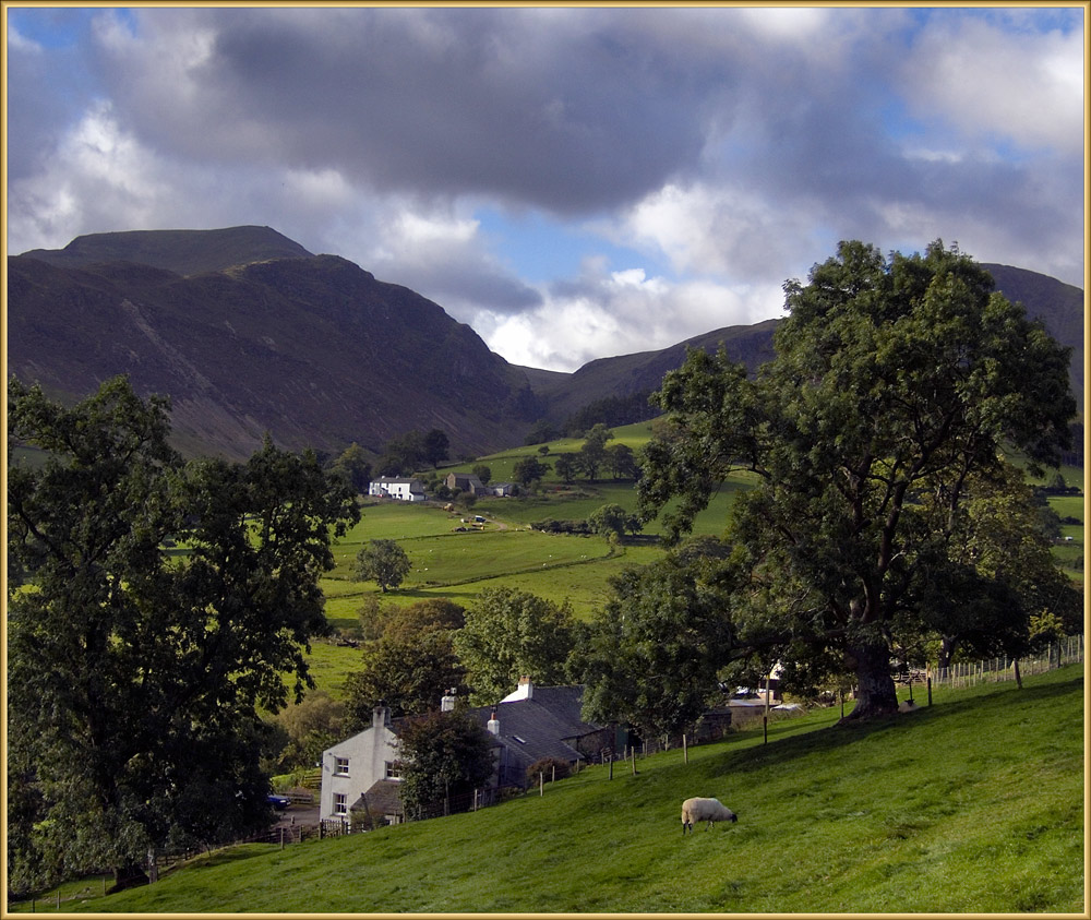 Afternoon sunshine on the farms in Newlands Pass, English Lake District