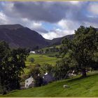 Afternoon sunshine on the farms in Newlands Pass, English Lake District