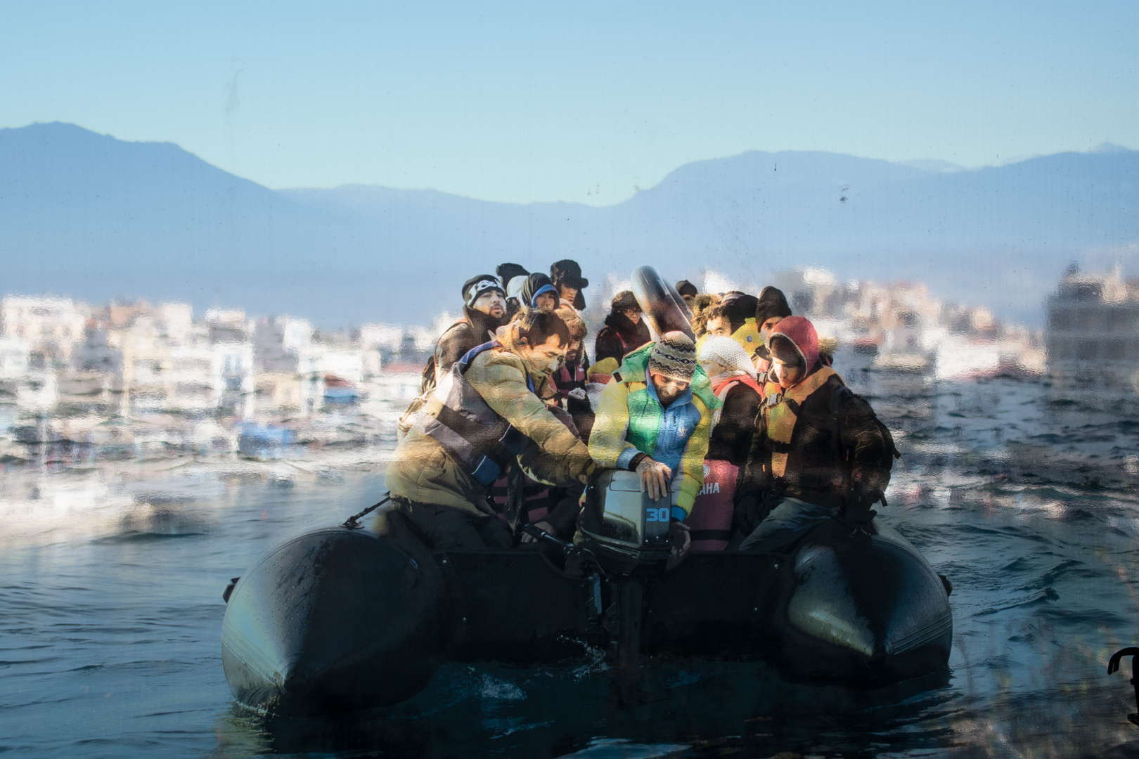 Agios Nikolaos auf Kreta,Menschen auf der Flucht, Fotomontage