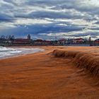 agua y arena luanco