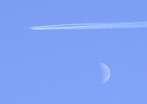 Airplane at the moon