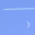 Airplane at the moon