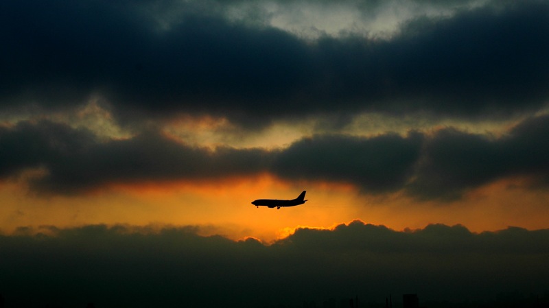 Airplane meets airplane in the evening sun