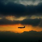 Airplane meets airplane in the evening sun