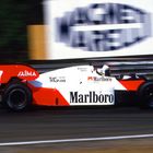 Alain Prost ( F ) Gegengerade in Zolder Belgien. Im McLaren TAG Turbo Porsche