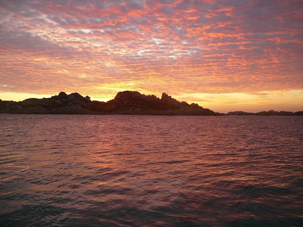 alba al porto della Madonna