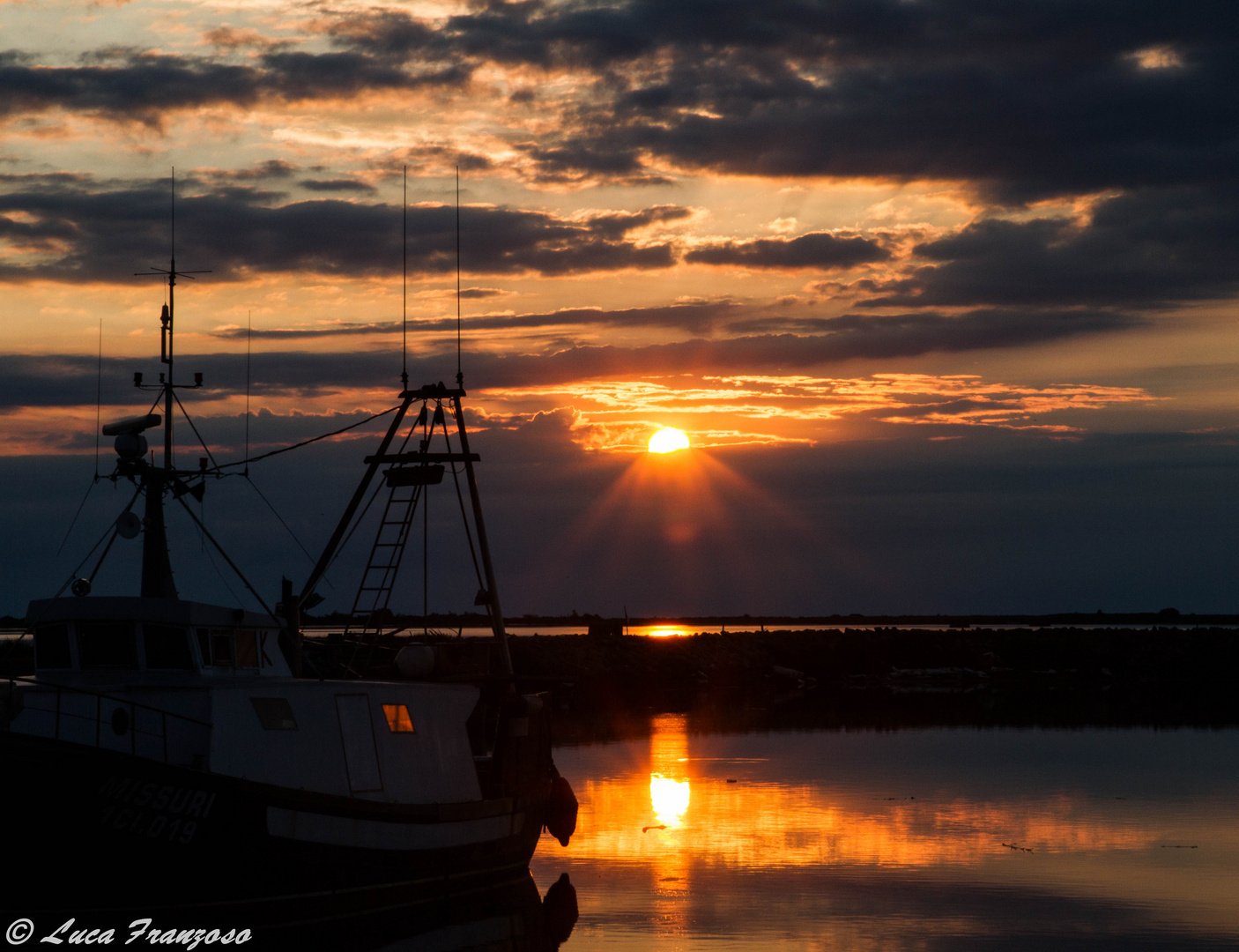 Alba in peschereccio