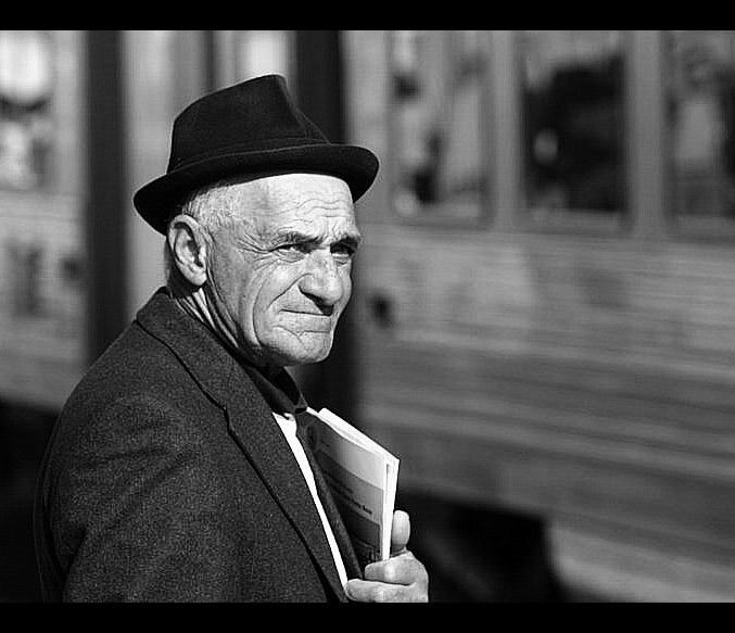 Alejandro is waiting for his wife on trainstation in Aveiro