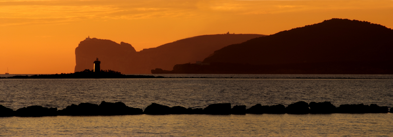 Alghero: Veduta di Capo Caccia al tramonto