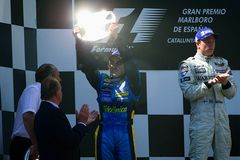 Alonso presents his shiny trophy