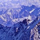 Alpenlandschaft mit Segelflugzeug.