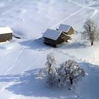 Alphütten im Winter