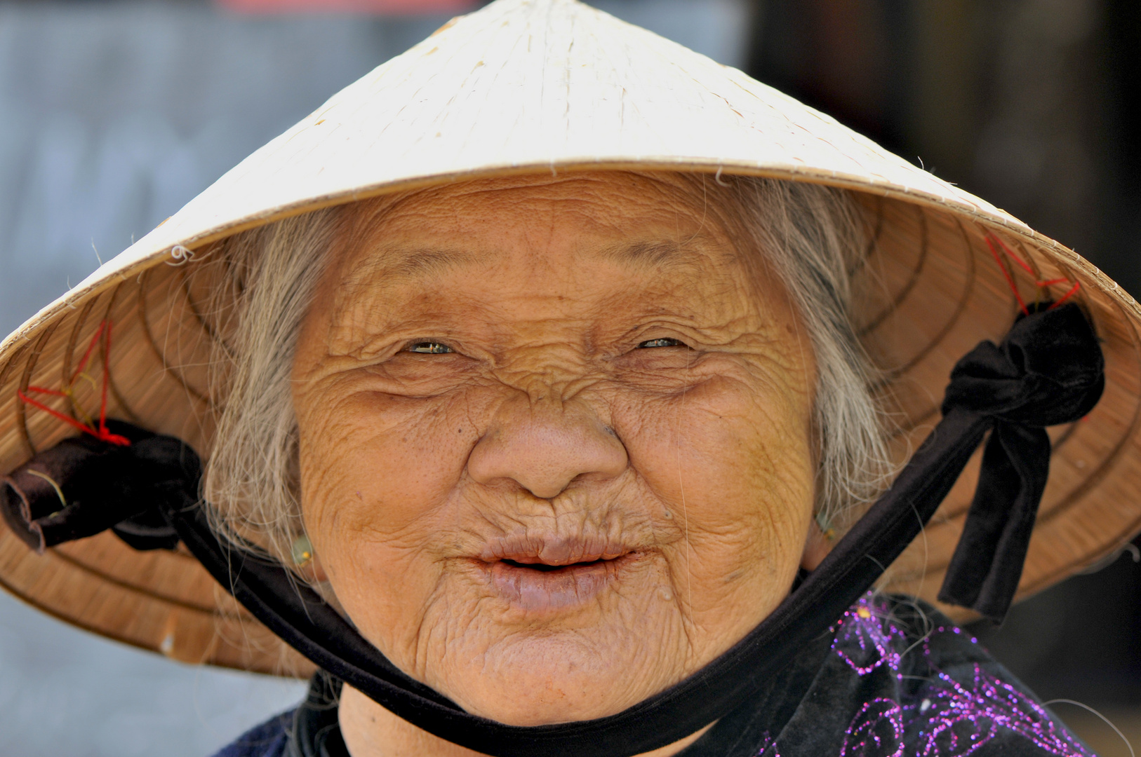 Alte Frau in Hoi An