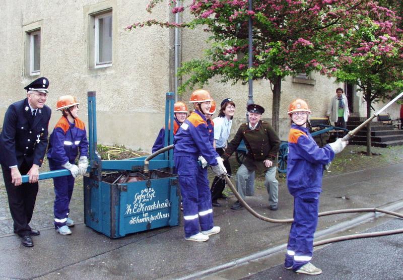 Alte Löschspritze mit Geschichte