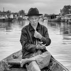 Alter Mann auf dem Thu Bon River
