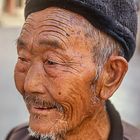 Alter Straßenhändler in Yunnan