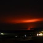 Am Lake Mývatn erleuchtet der Ausbruch des Holuhraun die Wolken