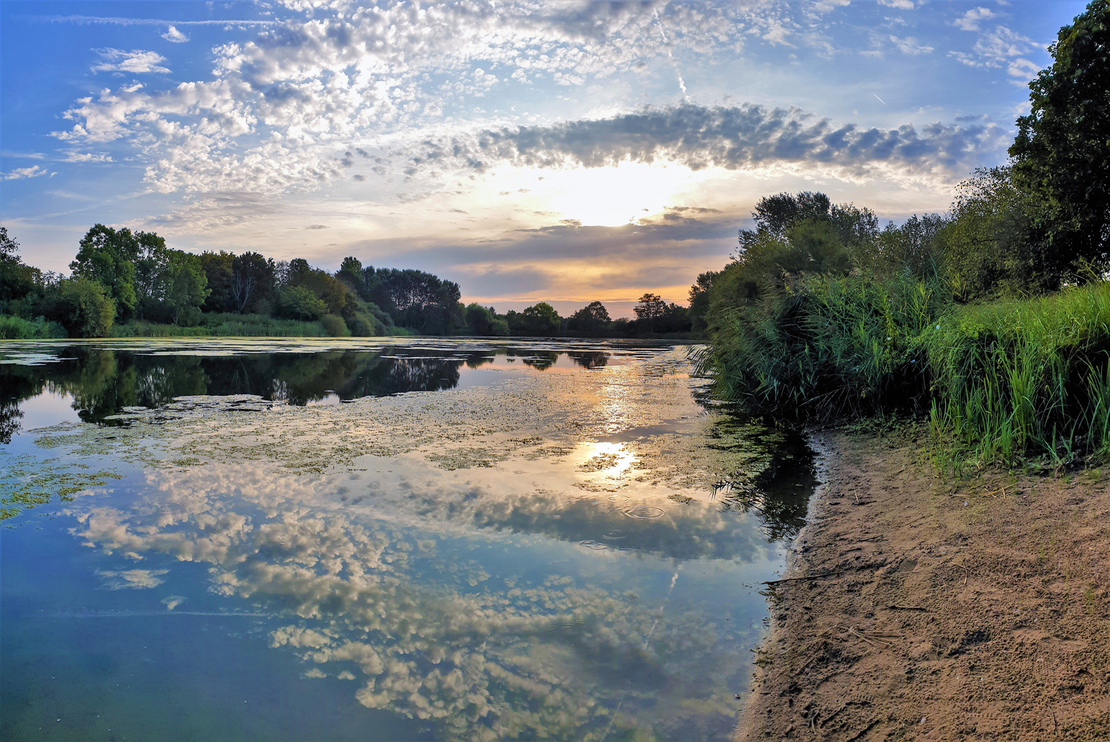 am see sonnenaufgang im wolken