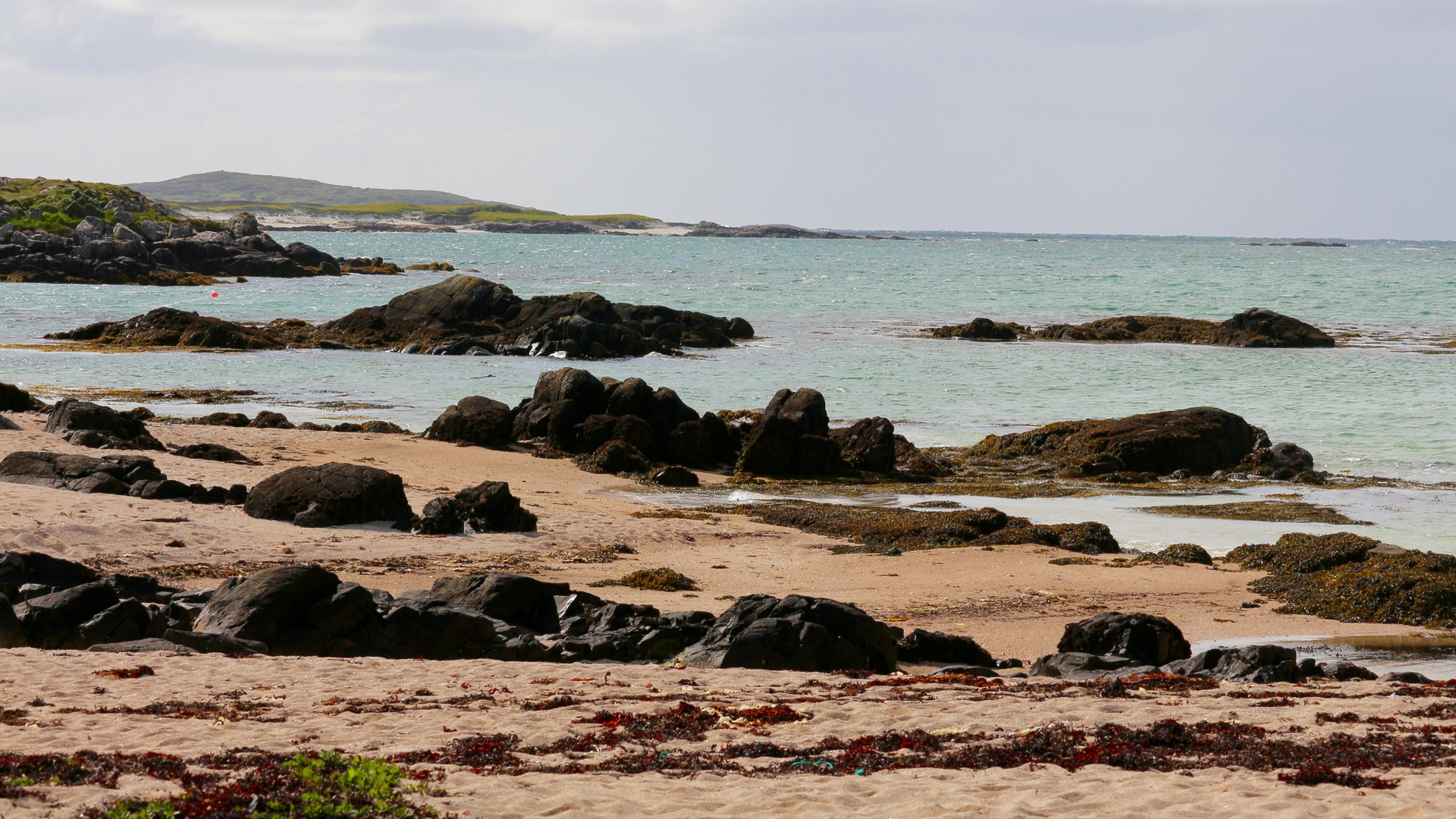 Am Strand in einem anderen Land