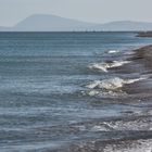 am Winter-Strand von Marotta mit Blick bis zum