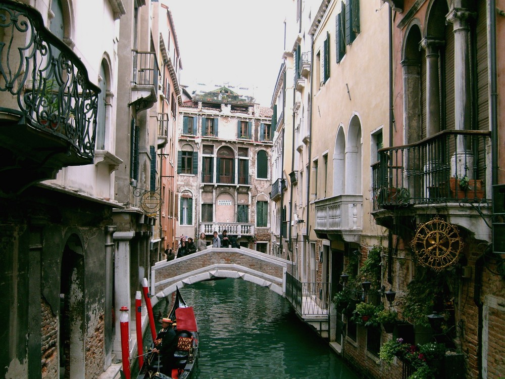 Amazing old buidings , windows ,stairs , water and a bridge