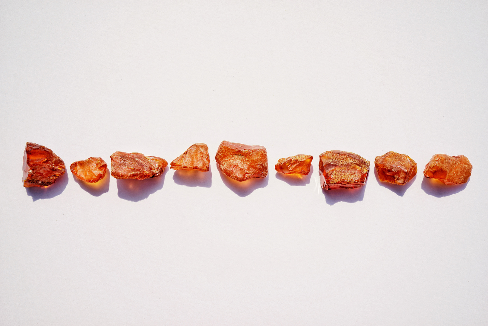 amber stones at white background