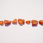 amber stones at white background