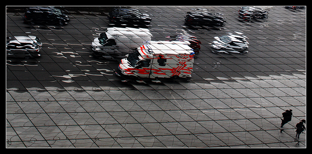 Ambulance vehicle in the mirror