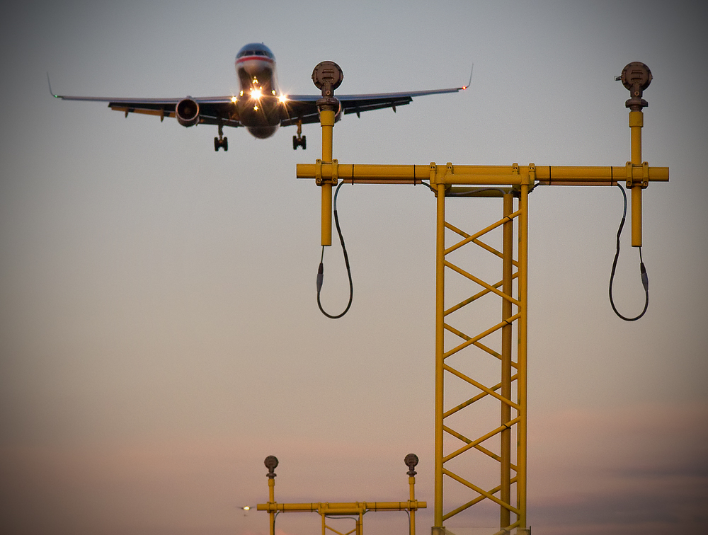 "American 156, cleared to land runway two-seven right"